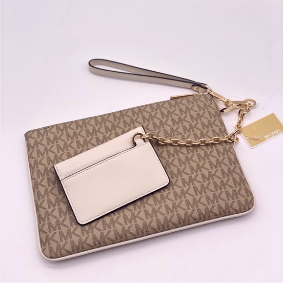 MICHAEL KORS JET SET TRAVEL LG 2 in 1
WRISTLET AND CARD CASE - Picture 12 of 13